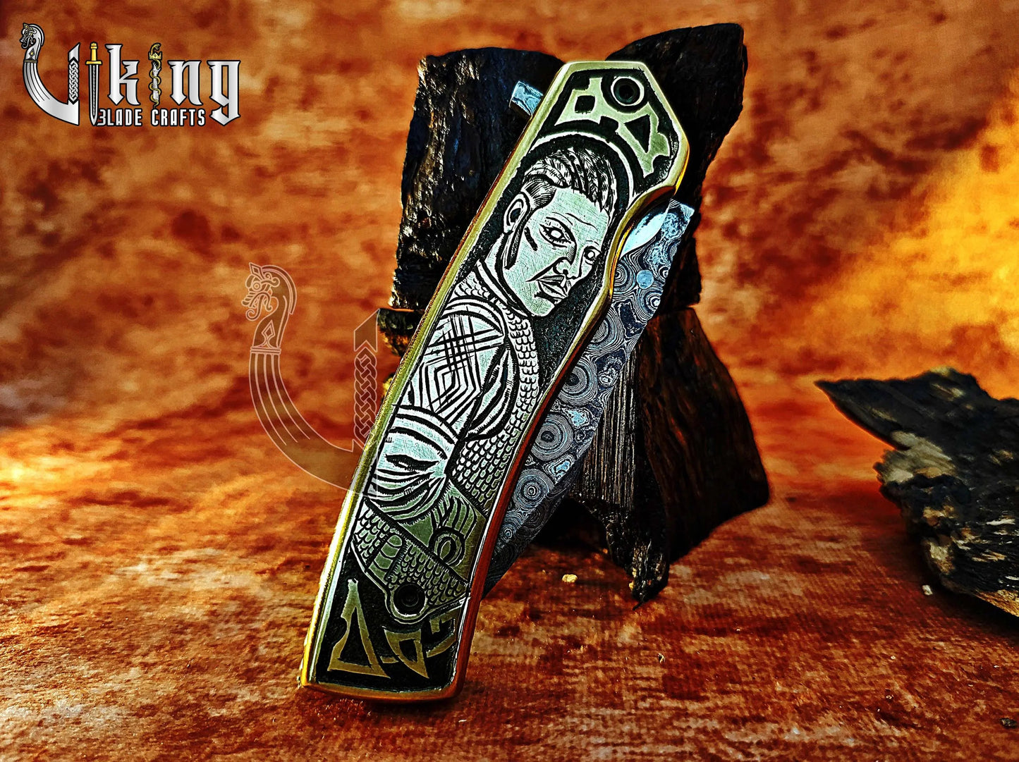 Handmade Damascus Folding Knife with Ivar the Boneless Carving Handle. Viking_Blade_Crafts
