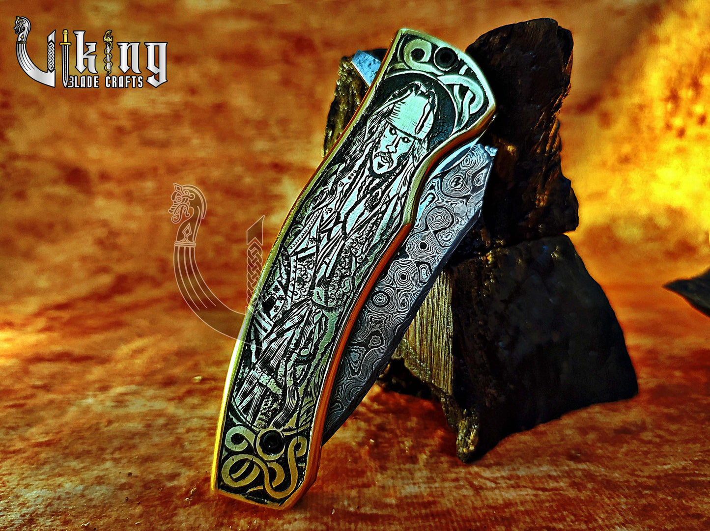 Damascus steel folding knife with Pirates of the Caribbean carved handle