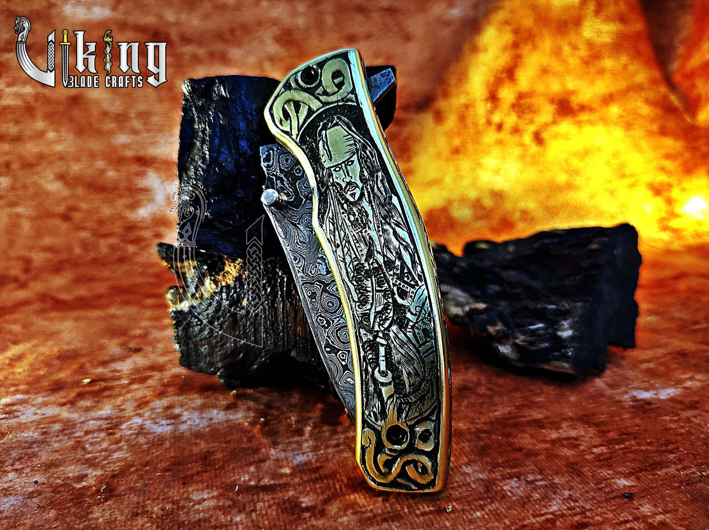 Damascus steel folding knife with Pirates of the Caribbean carved handle