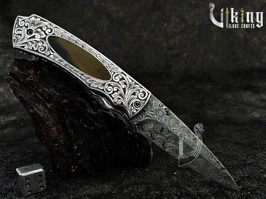 Handmade Damascus Steel Folding Knife – Hand Carved Handle & Stunning Craftsmanship Viking_Blade_Crafts
