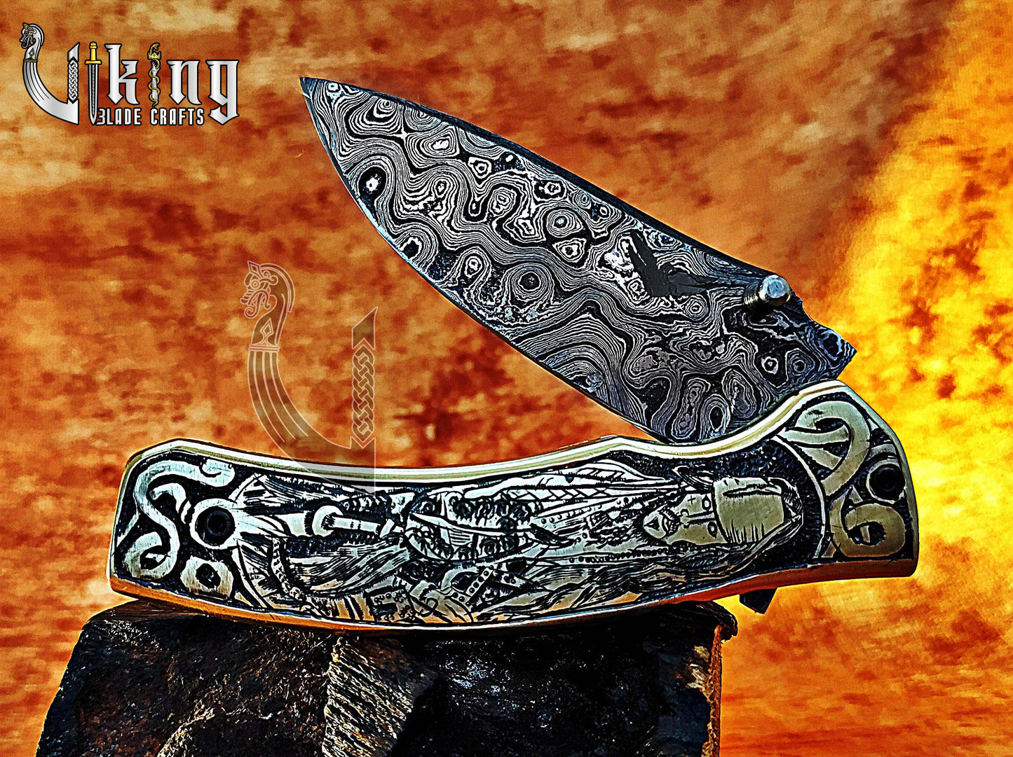 Damascus steel folding knife with Pirates of the Caribbean carved handle