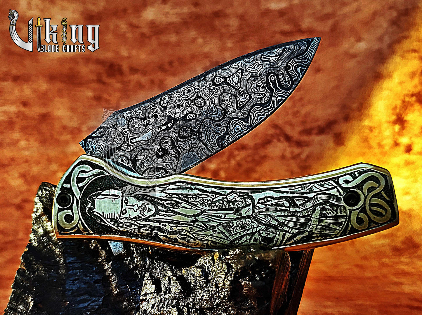 Damascus steel folding knife with Pirates of the Caribbean carved handle