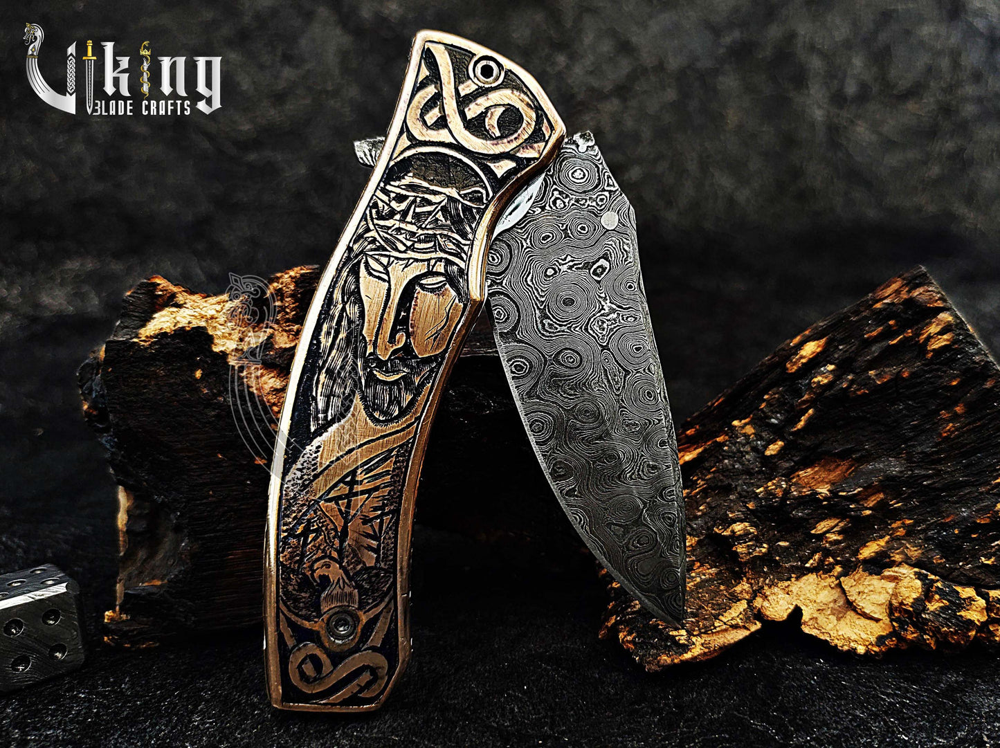 Damascus steel Folding knife with Jesus Crucifixion carved handle.