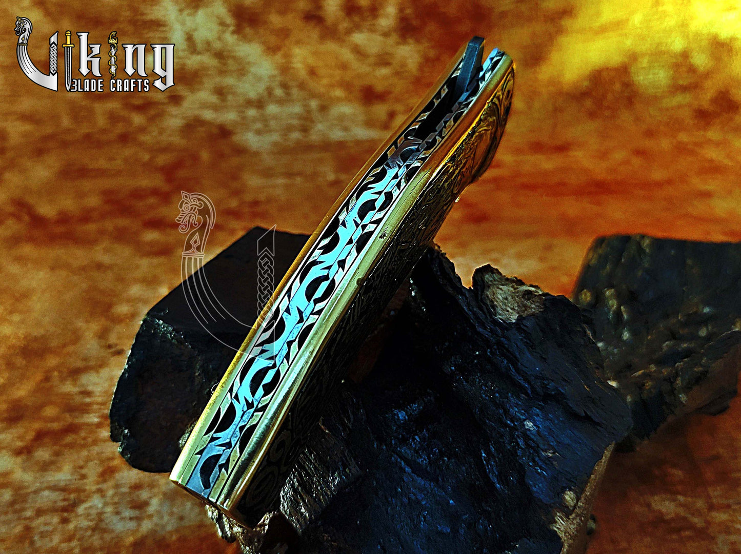 Damascus steel folding knife with Pirates of the Caribbean carved handle