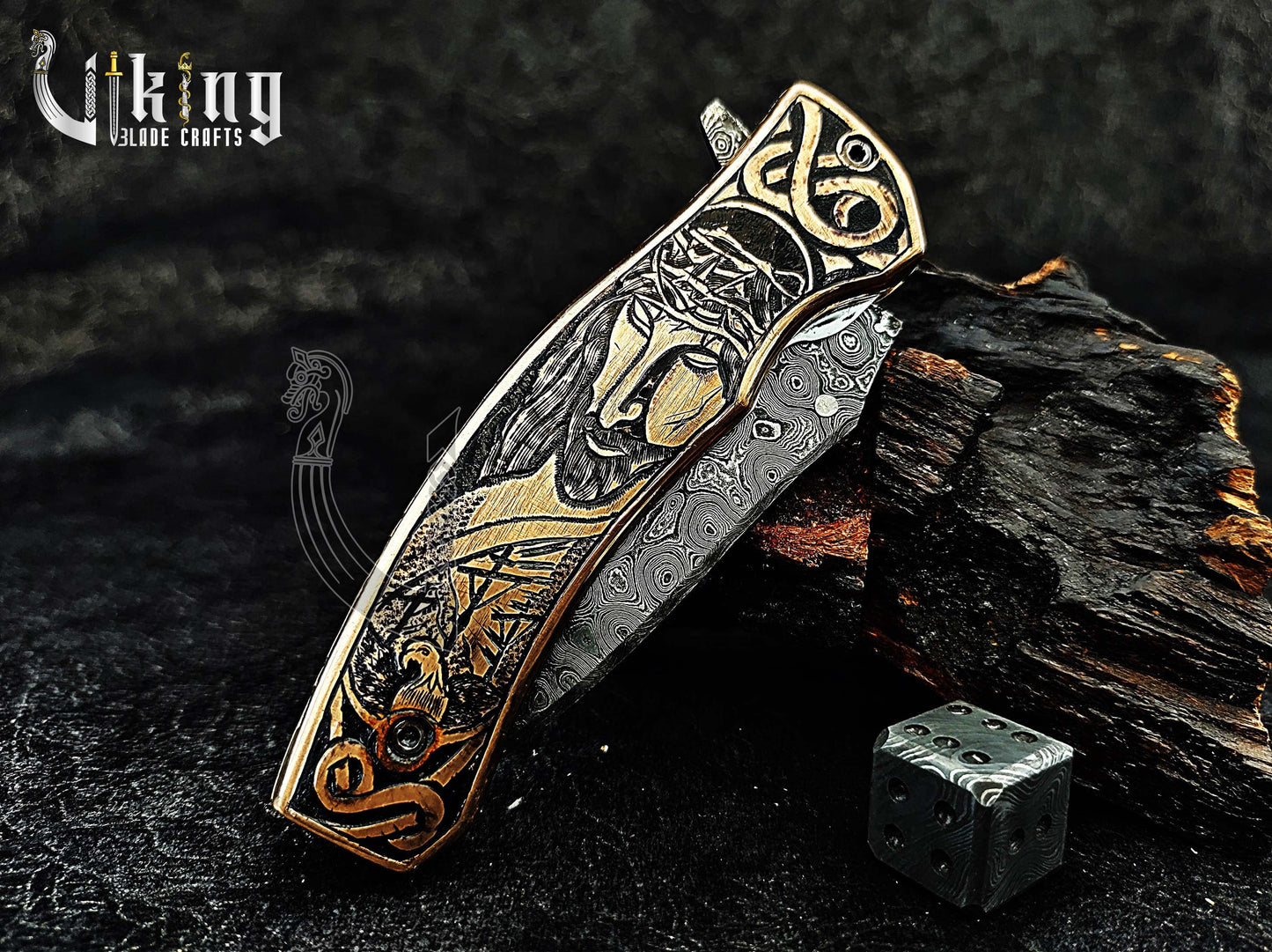 Damascus steel Folding knife with Jesus Crucifixion carved handle.