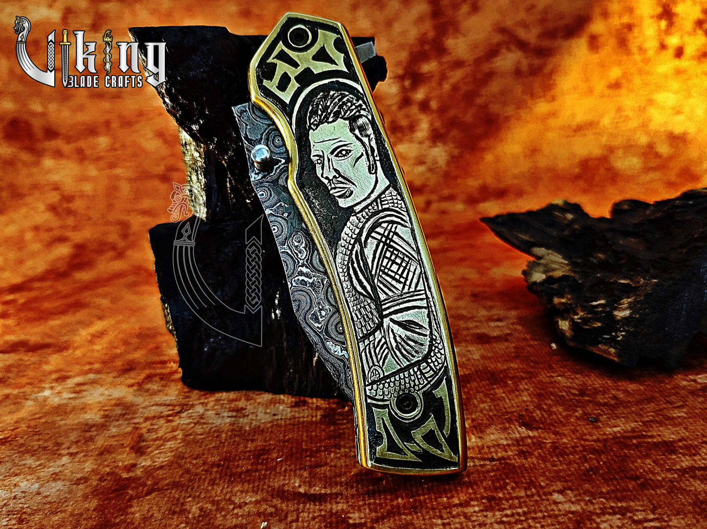 Handmade Damascus Folding Knife with Ivar the Boneless Carving Handle.