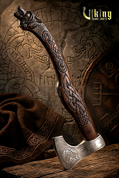 Viking battle axe with hand carved wolf handle and forged steel blade