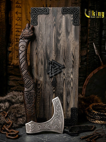 forged steel Viking axe with detailed wolf carving