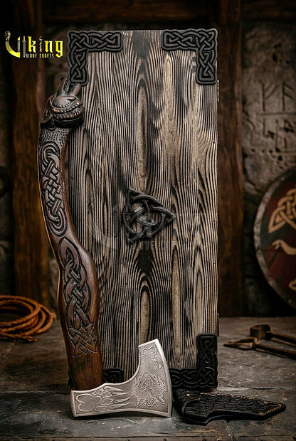 forged steel battle axe with detailed wolf head carving