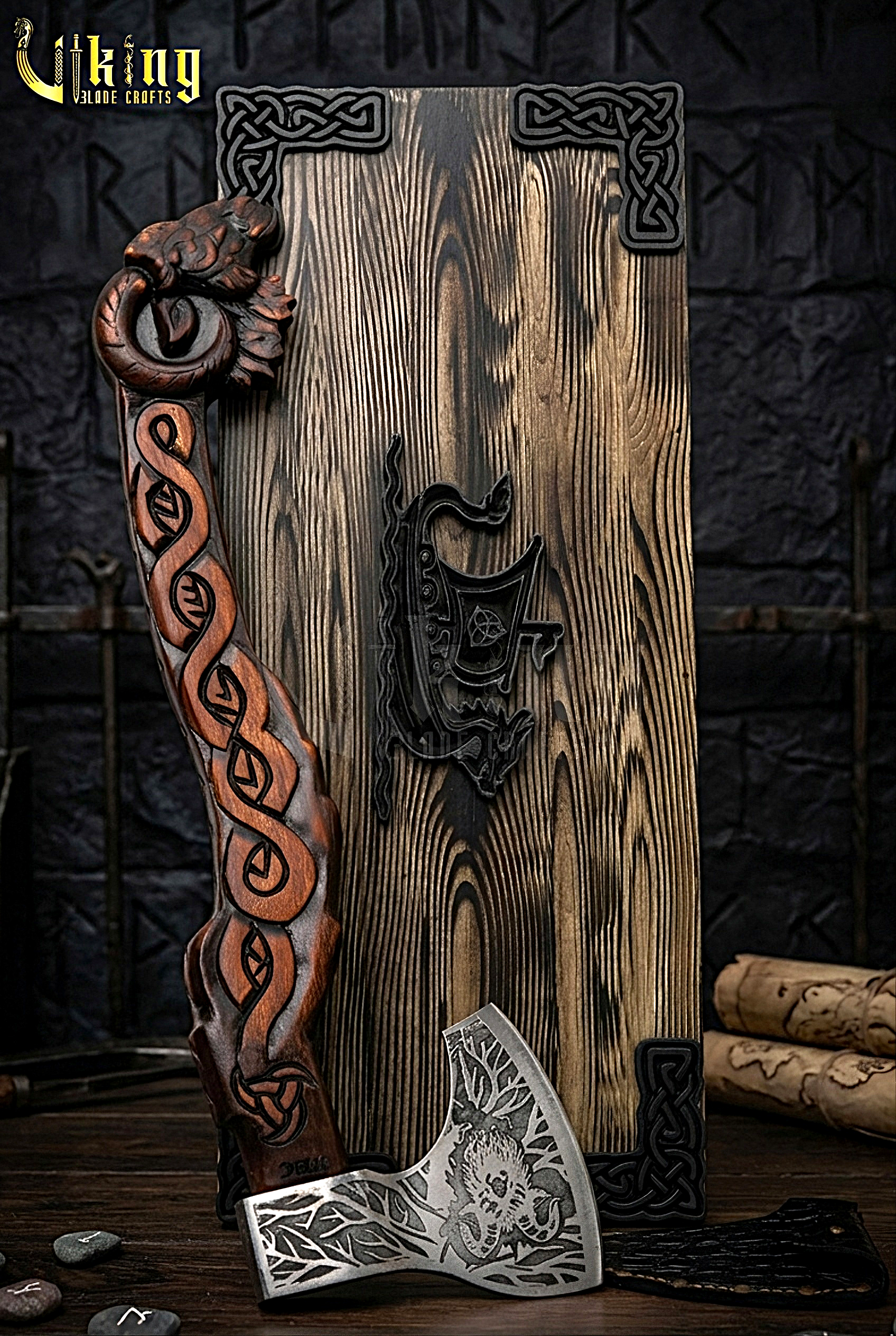 Norse Thor goat axe with carved wooden handle and steel blade