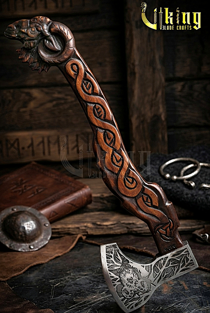 Norse Thor goat axe with carved wooden handle and steel blade