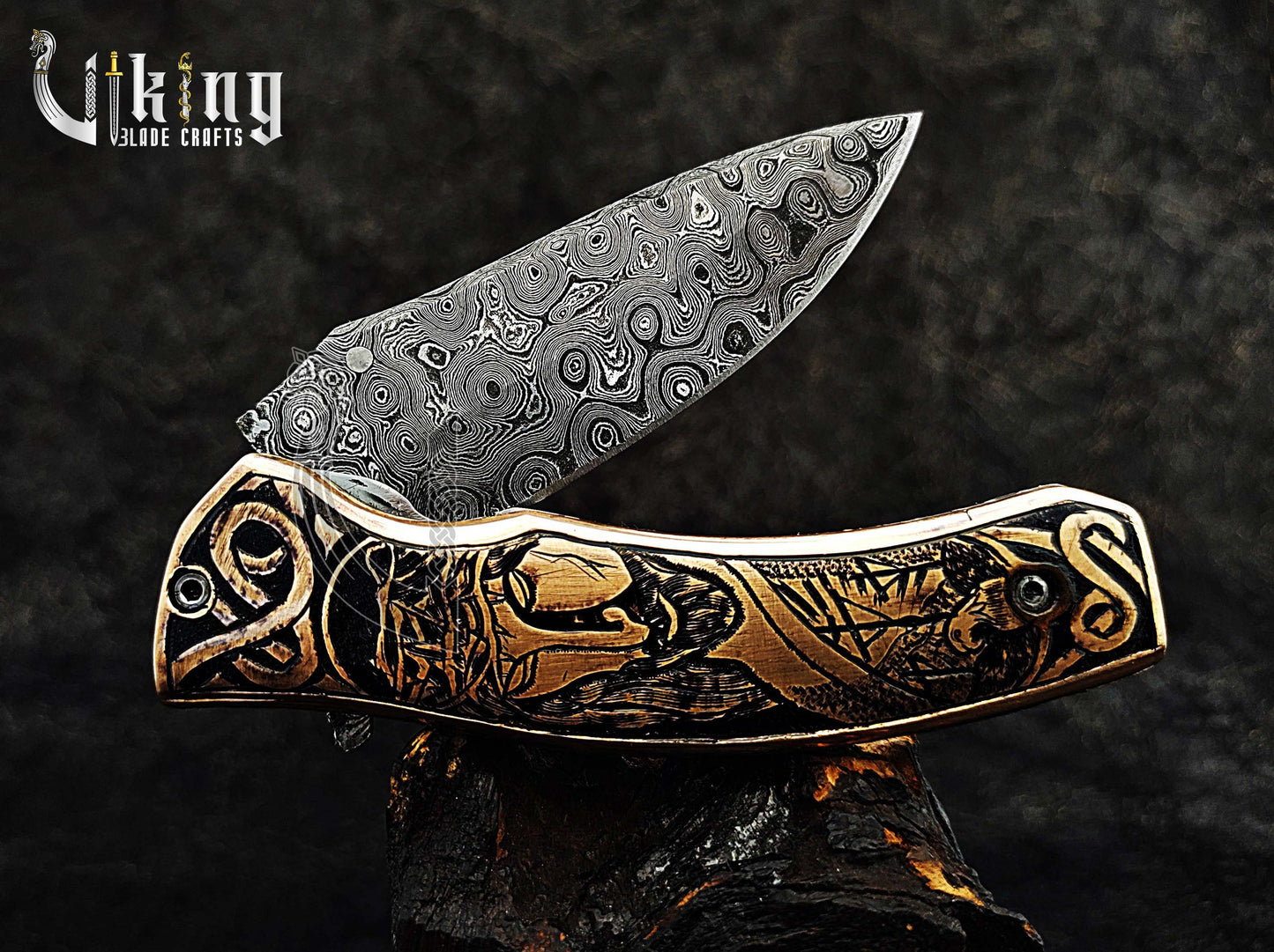 Damascus steel Folding knife with Jesus Crucifixion carved handle.