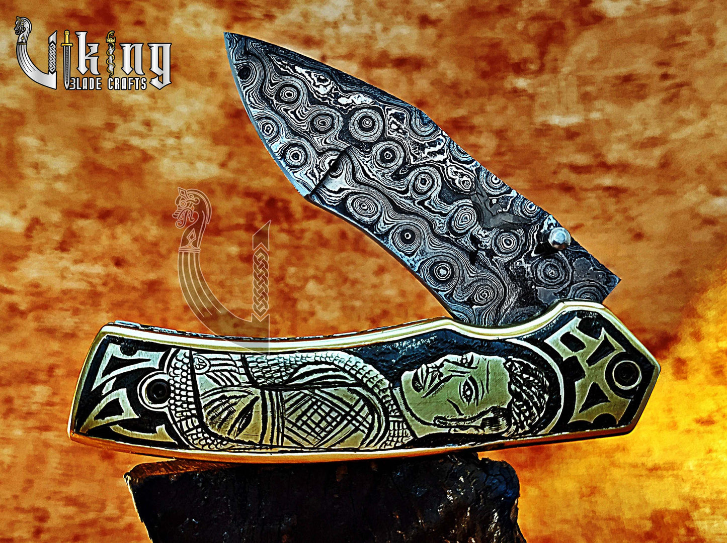 Handmade Damascus Folding Knife with Ivar the Boneless Carving Handle.