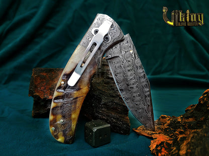 Hand-Forged Damascus Steel Folding Knife | Raindrop Pattern | Ram Horn Handle