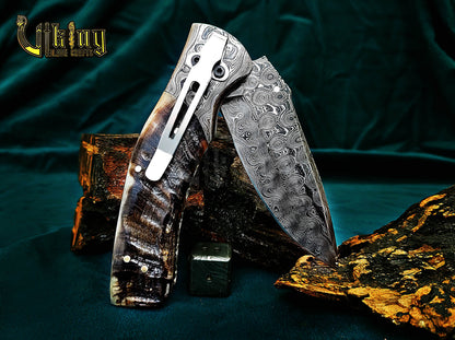 Hand-Forged Artisan Damascus Steel Folding Knife | Raindrop Pattern | Ram Horn Handle