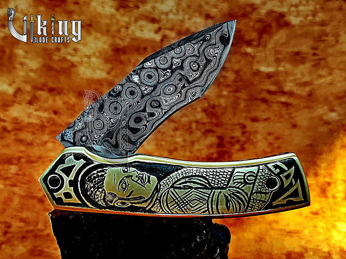 Handmade Damascus Folding Knife with Ivar the Boneless Carving Handle.