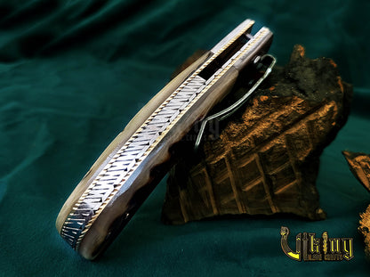 Hand-Forged Damascus Steel Folding Knife | Raindrop Pattern | Ram Horn Handle