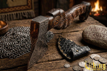 Norse Hrafn axe with detailed wood carving and steel blade