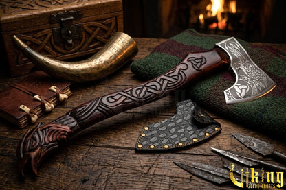 Norse Hrafn axe with detailed wood carving and steel blade