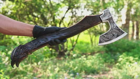 Odin Viking axe with raven Valknut handle and forged steel blade