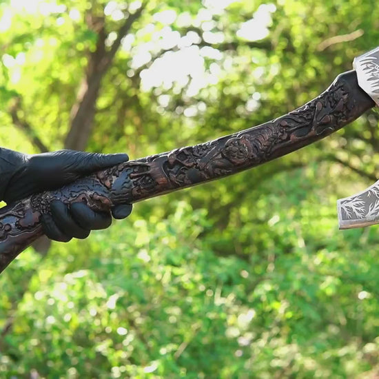 wildlife Viking axe with hand carved handle and forged steel blade