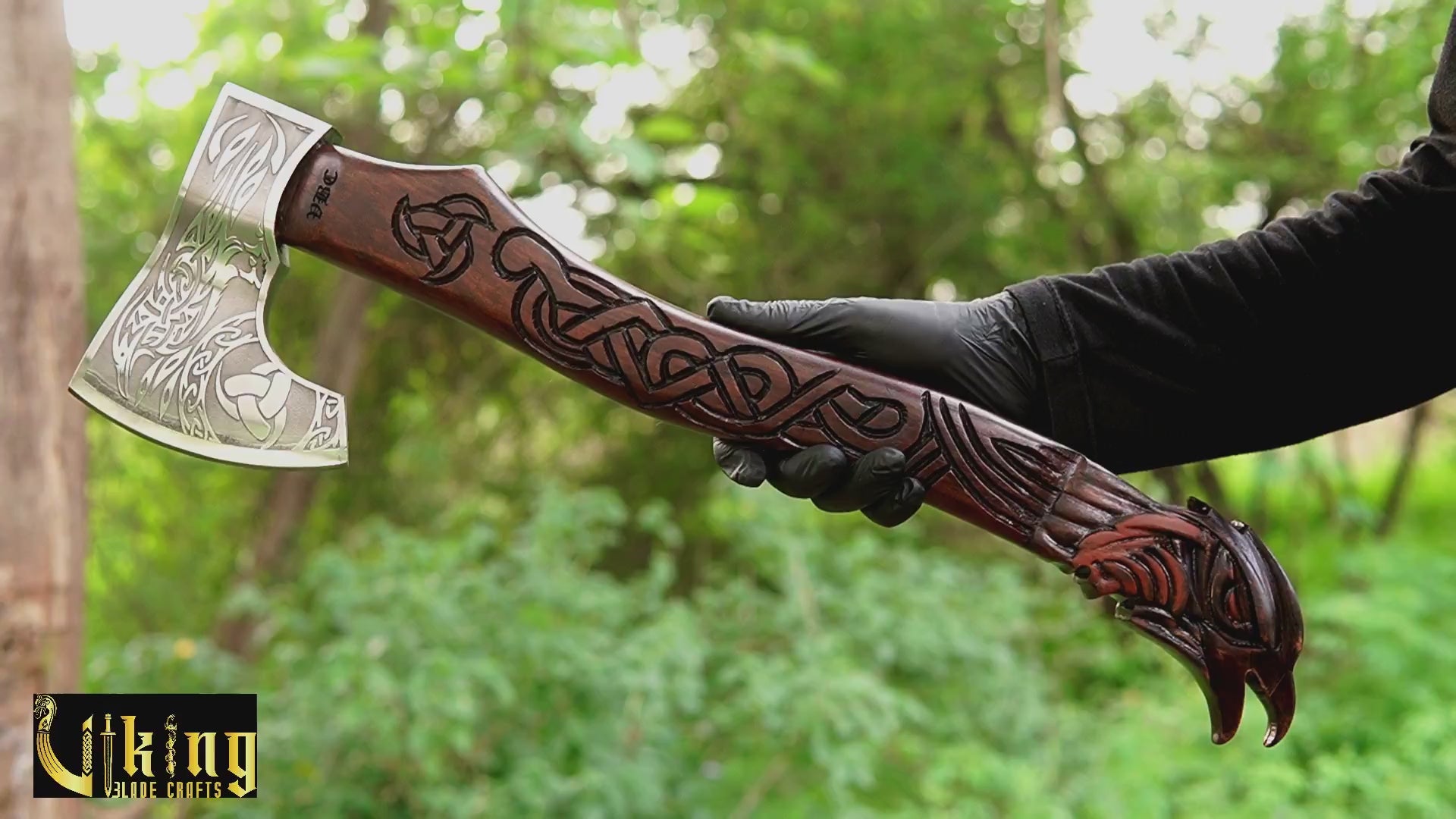Raven Viking axe with hand carved handle and forged steel blade