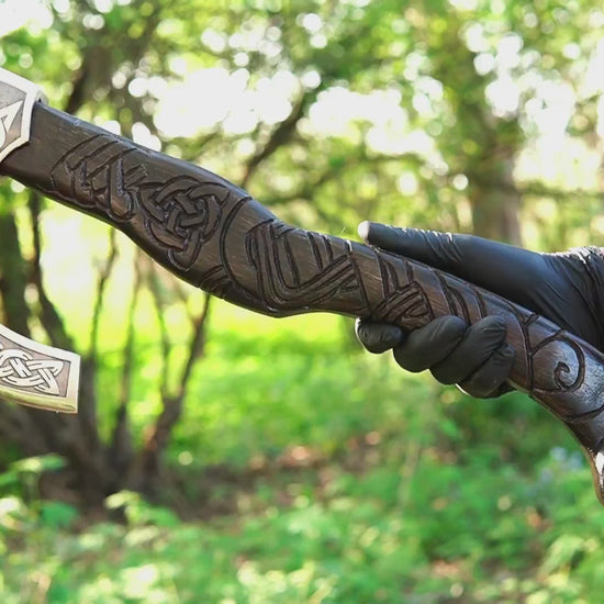 Fenrir Viking axe with hand carved wolf handle and forged steel blade